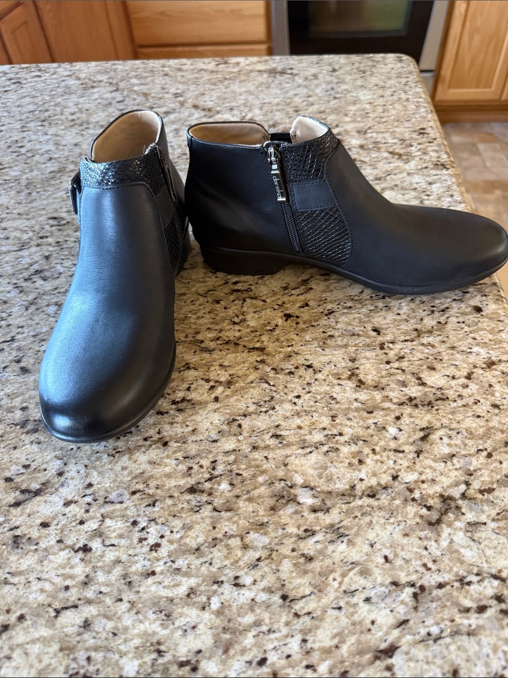 Dansko Black Leather Ankle Booties with Textured Trim